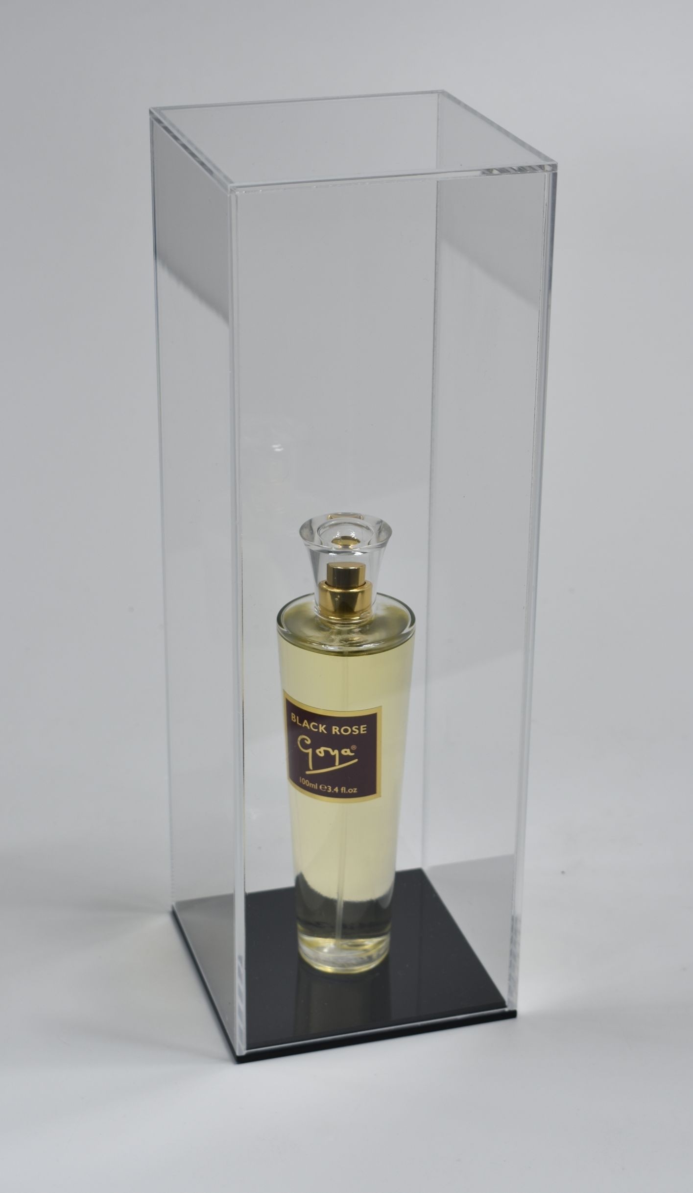 Perfume bottle top display case